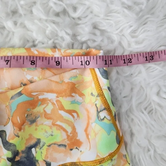 Fabletics Define PowerHold® High-Waisted 7/8 Legging. Color: PAINTED MARIGOLD. S - Picture 6 of 12